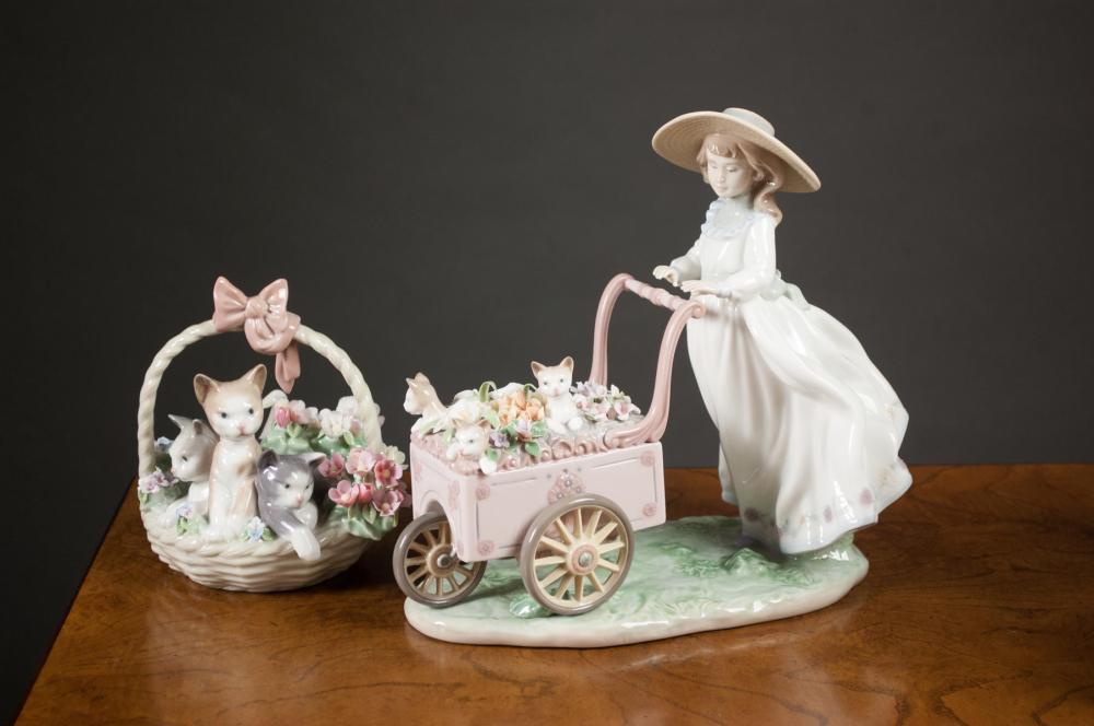 Appraisal: TWO LLADRO PORCELAIN FIGURINES includes Kitty Cart sculptor Regino Torrijos