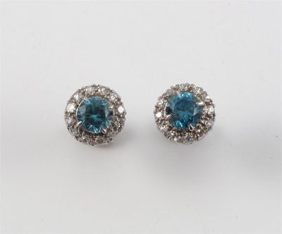 Appraisal: A pair of zircon and diamond cluster ear studs The