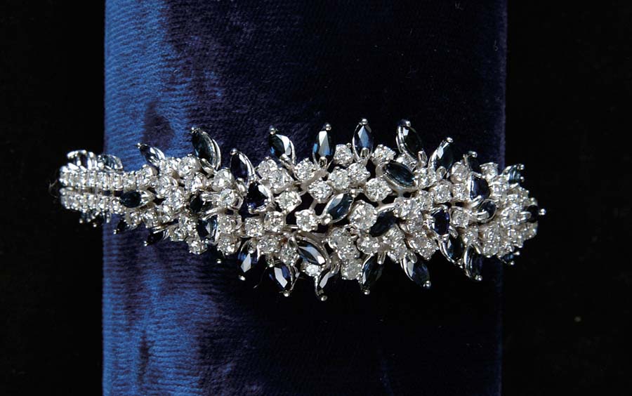 Appraisal: DIAMOND SAPPHIRE BRACELET Spectacular white gold bracelet is entirely covered