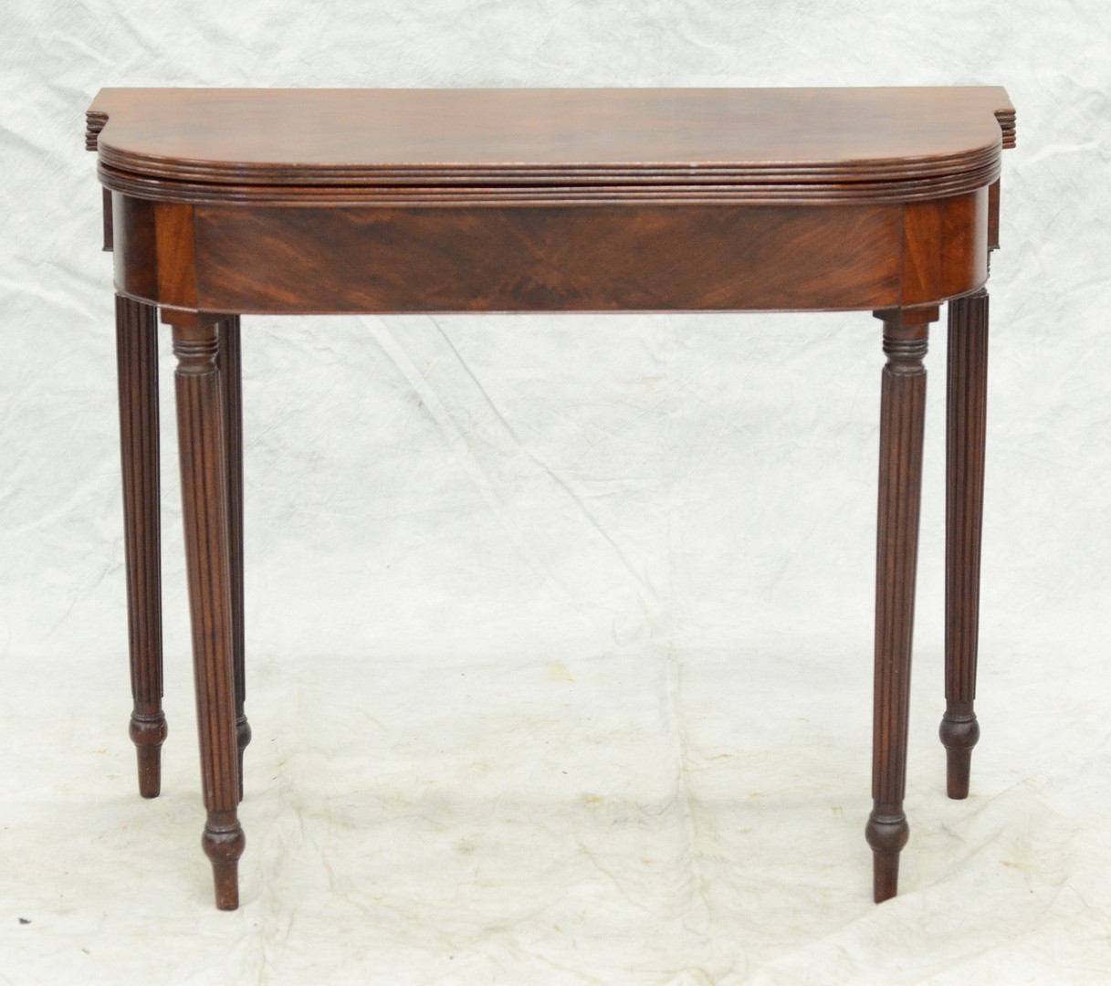 Appraisal: Mahogany Philadelphia Sheraton game table with reeded edge and legs