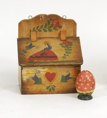 Appraisal: TWO PETER HUNT-RELATED PAINTED WOODEN ITEMS Egg-form salt shaker decorated