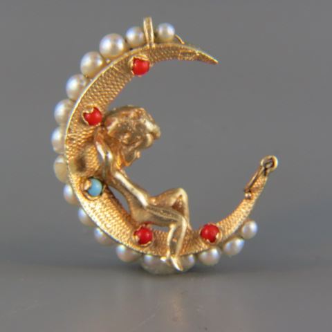 Appraisal: k Gold Charm with Childresting on a cresent moon with