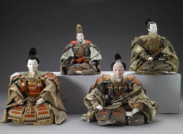 Appraisal: Four musha ningyo warrior dolls Each with carved wooden heads