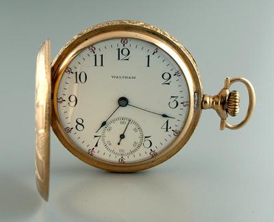 Appraisal: Man's gold pocket watch porcelain face signed Waltham boldly engraved