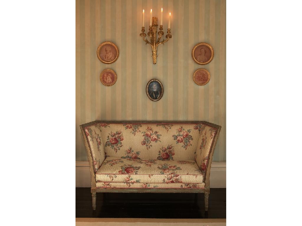 Appraisal: A LOUIS XVI STYLE SMALL SOFA upholstered in chintz fabric