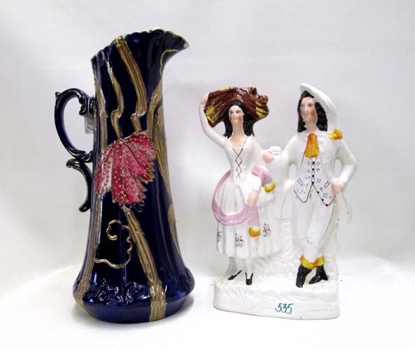 Appraisal: STAFFORDSHIRE PORCELAIN FIGURINE PORCELAIN PITCHER pieces Staffordshire figural group depicting