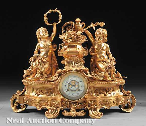 Appraisal: A Louis XVI-Style Gilt Bronze Figural Mantel Clock central pedestal