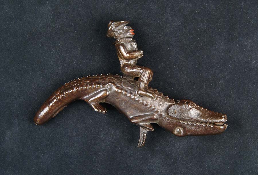 Appraisal: MAN ON ALLIGATOR ANIMATED TOY CAP GUN AN Manufactured by