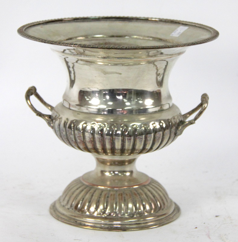 Appraisal: A silver plate campana shaped wine cooler with loop handles