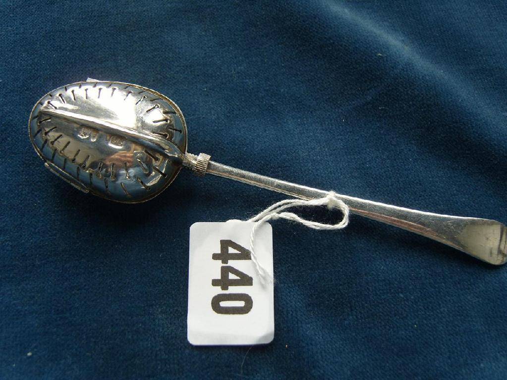 Appraisal: A Georgian style patent casting spoon in the Old English