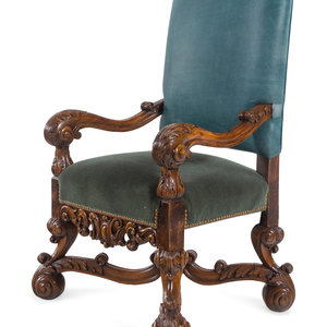 Appraisal: A Henri II Style Carved Walnut Armchair with Green Leather