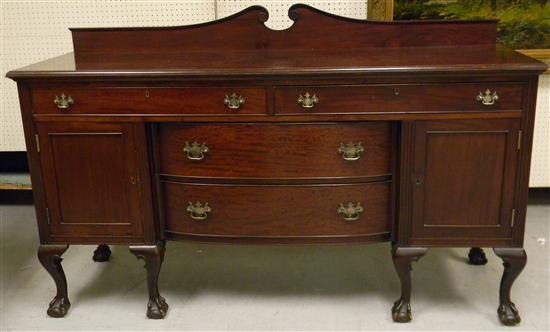 Appraisal: Sideboard mahogany broken scroll crest two drawers over two claw