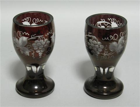 Appraisal: PAIR OF BOHEMIAN GLASS GOBLETS Of typical form with thick