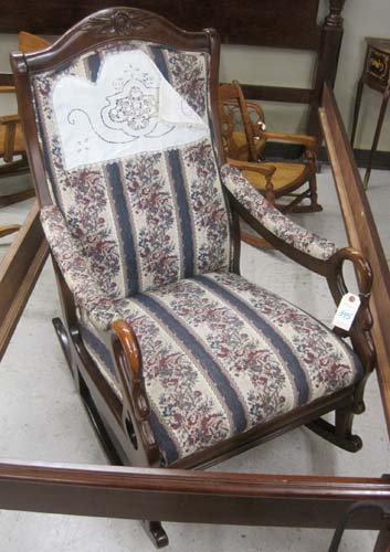 Appraisal: EMPIRE STYLE MAHOGANY SWAN-ARM ROCKING CHAIR American made dated having