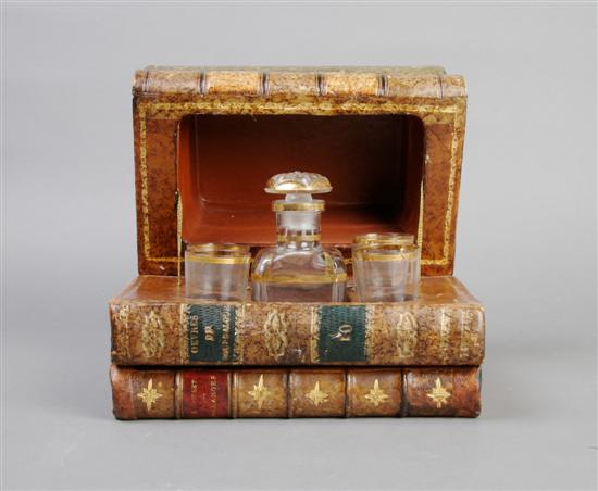 Appraisal: A French Book Form Decanter and Glass Case Height inches