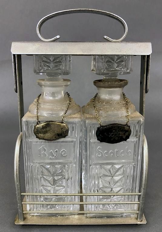 Appraisal: Pressed Glass Decanters Pressed glass rye and scotch decanters in