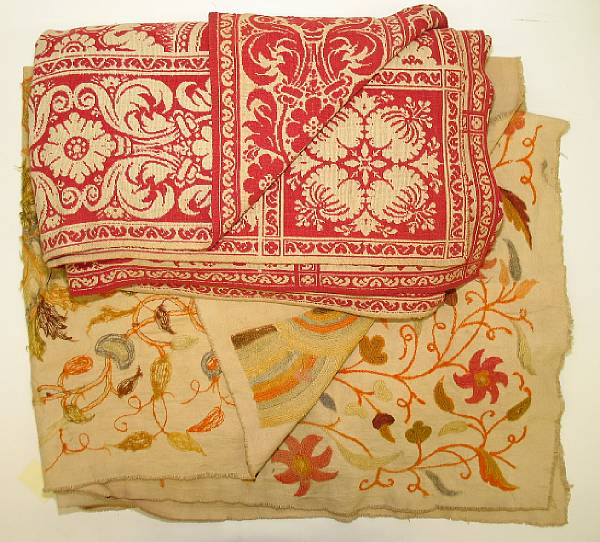 Appraisal: An American jacquard woven red coverlet and a crewel work