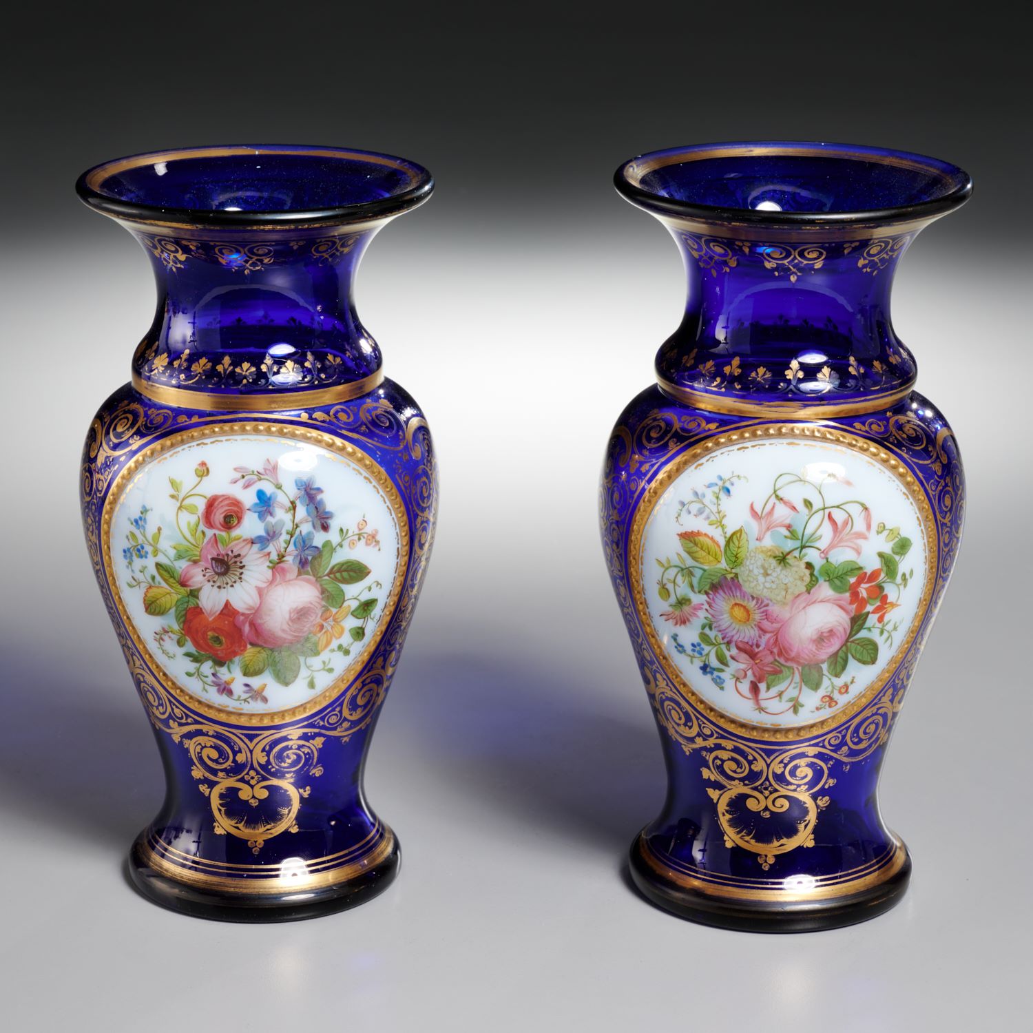 Appraisal: PAIR BACCARAT ATTRIB DECORATED GLASS VASES th c France gilt