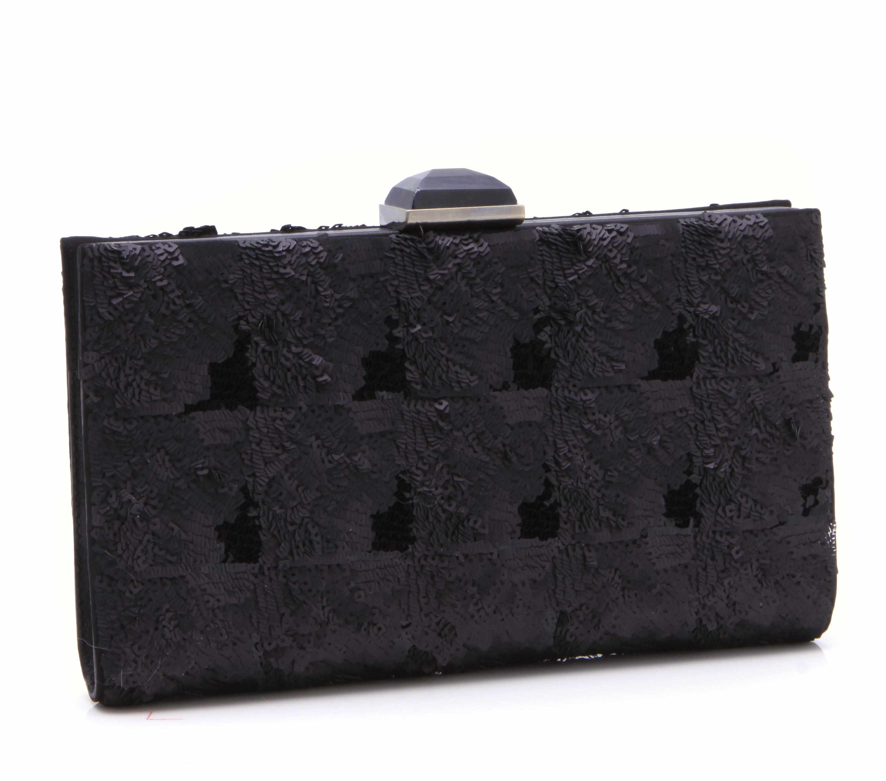 Appraisal: A Salvatore Ferragamo sequined black leather clutch height in width