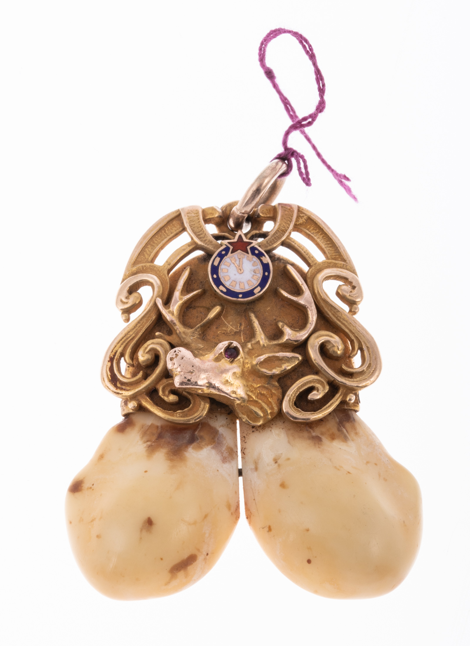 Appraisal: ELKS TOOTH PENDANT IN ART NOUVEAU STYLE Ruby eye initials