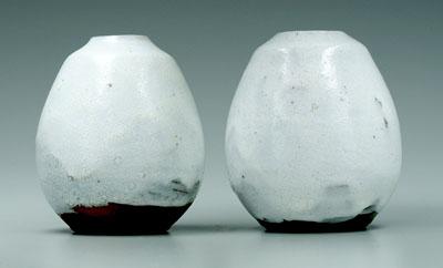 Appraisal: Two Jugtown egg vases both with foamy white glaze impressed