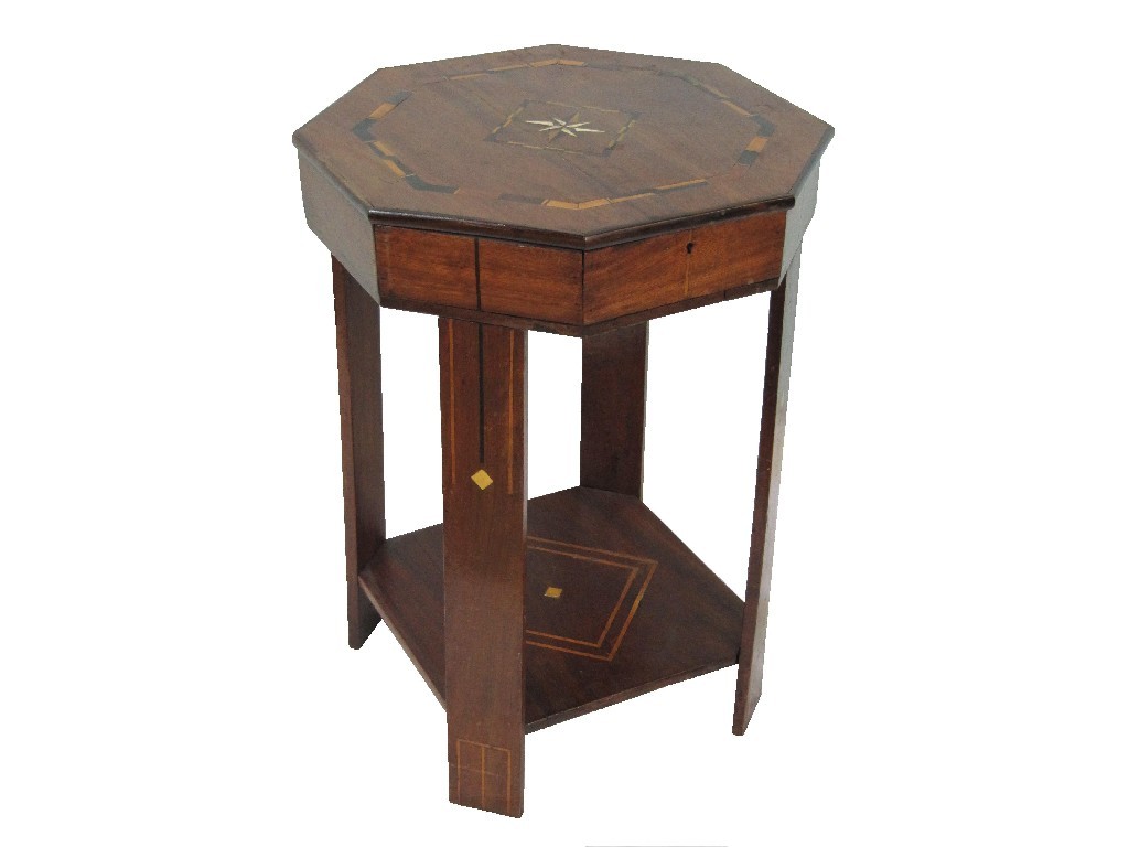 Appraisal: An Art Deco mahogany octagonal inlaid sewing table