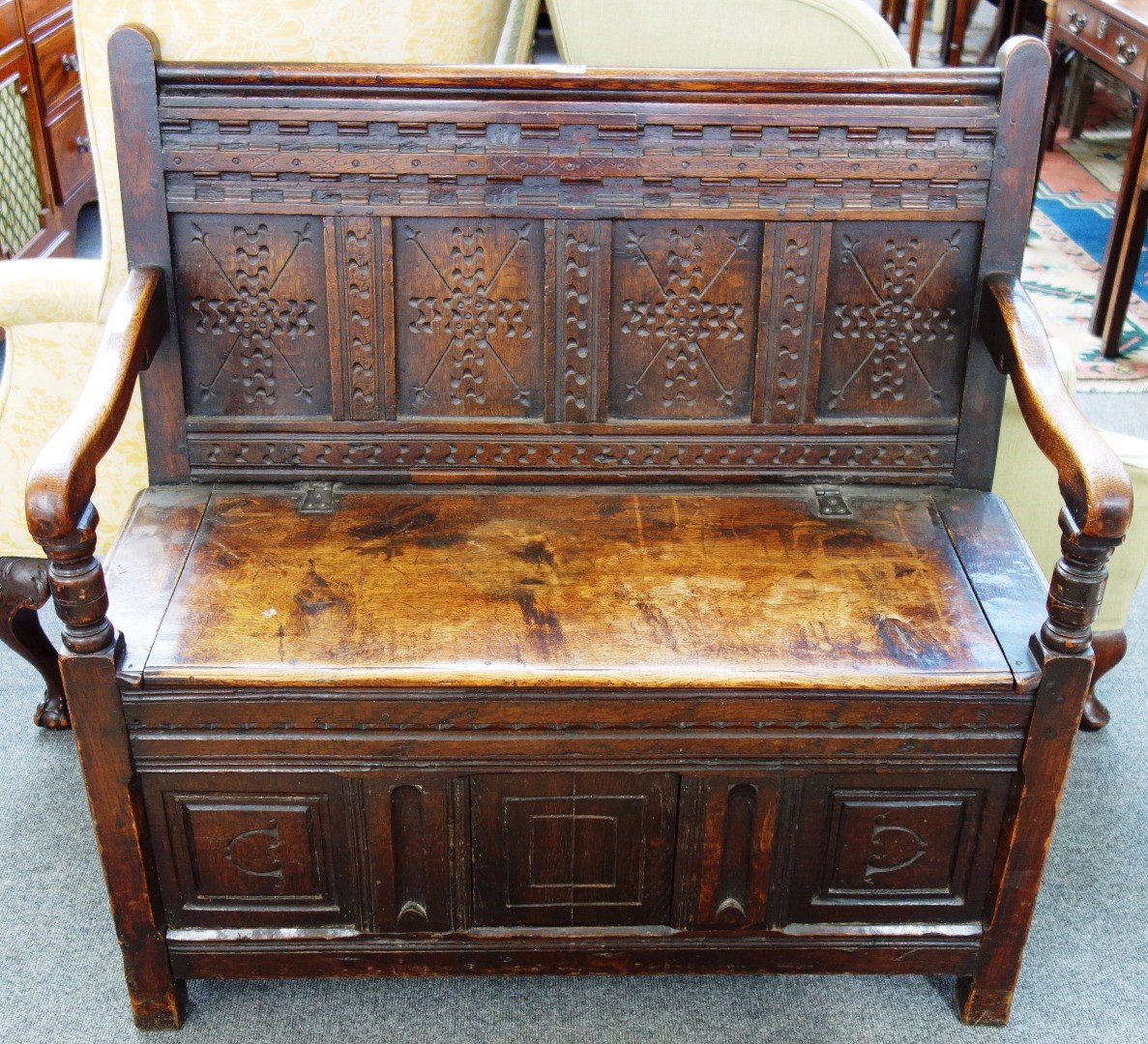 Appraisal: An th century and later oak box settle the triple