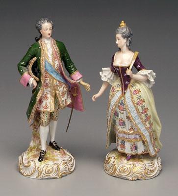 Appraisal: Pair porcelain figures man with sword and woman with fan