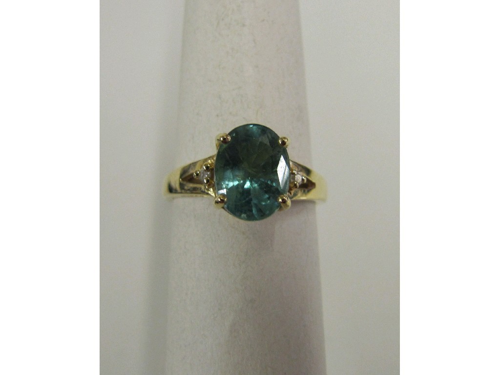 Appraisal: Eighteen carat gold emerald and diamond set dress ring