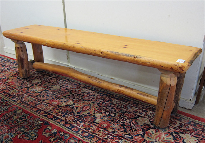 Appraisal: JUNIPER LOG BENCH American made recent production foot-of-the-bed length Dimensions