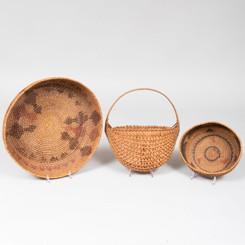 Appraisal: Group of Three Woven Baskets Comprising A shallow basket A