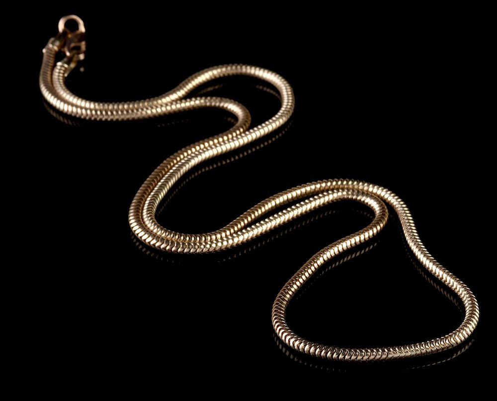 Appraisal: A CONTEMPORARY K GOLD SERPENTINE SNAKE CHAIN Marked k near