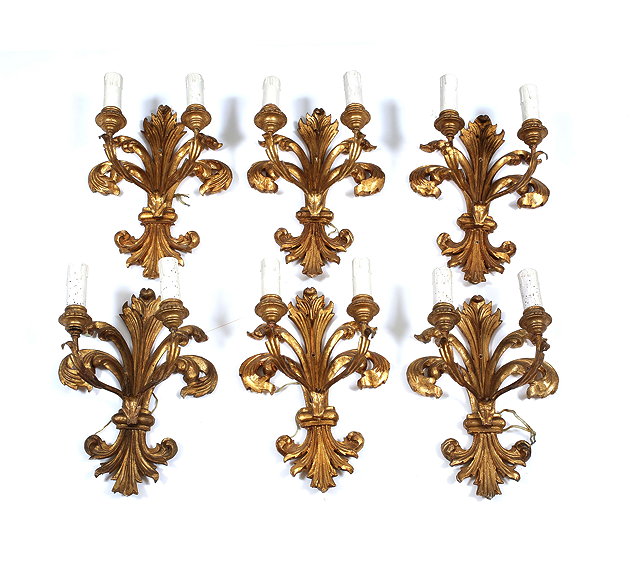 Appraisal: A SET OF SIX CARVED GILTWOOD TWIN BRANCH WALL LIGHTS