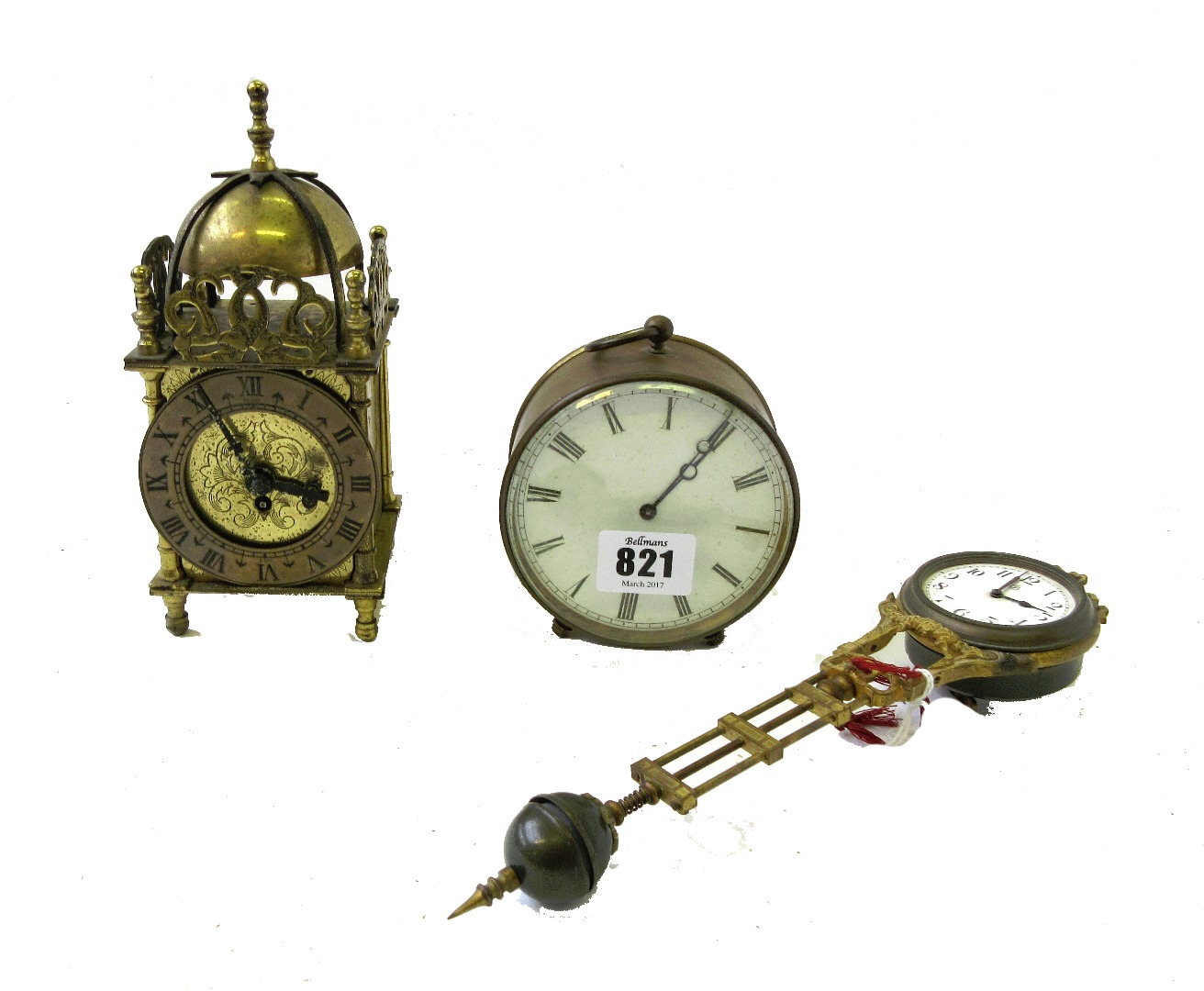 Appraisal: A French brass drum cased mantel clock with white enamel