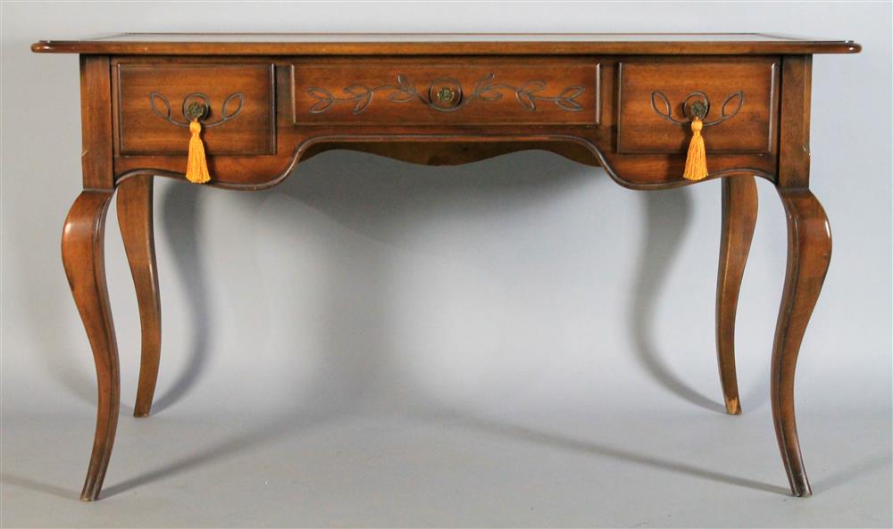 Appraisal: HEKMAN COUNTRY FRENCH STYLE OAK CARVED DESK rectangular molded top