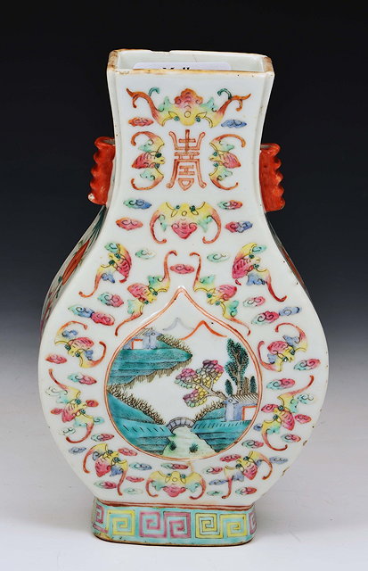 Appraisal: A CHINESE PORCELAIN FLATTENED BALUSTER TWO HANDLED VASE decorated lotus