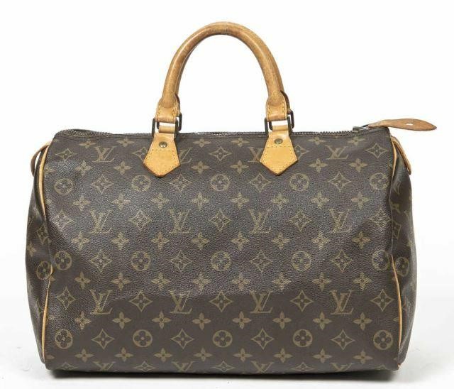 Appraisal: Louis Vuitton Speedy handbag in monogram coated canvas with brass