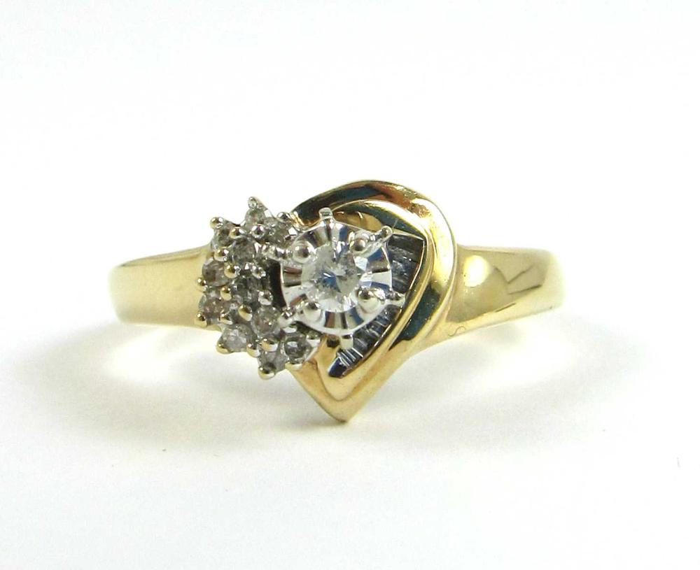 Appraisal: DIAMOND RING Round and tapered baguette diamonds K gold Size