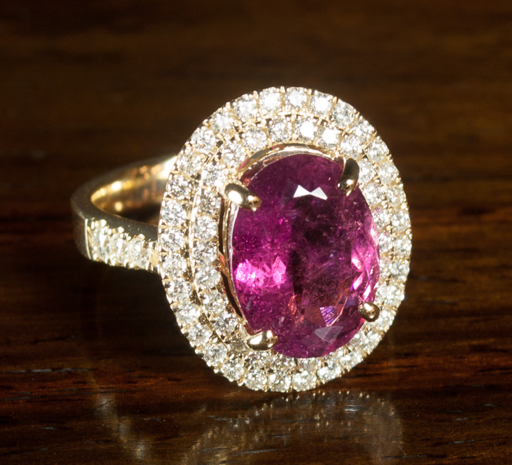 Appraisal: PINK TOURMALINE AND DIAMOND RING k yellow gold with round-cut