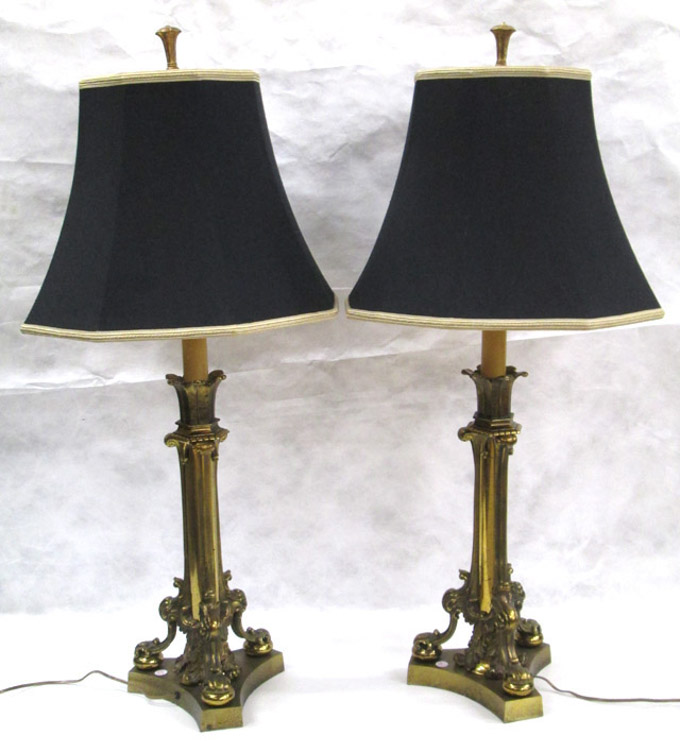 Appraisal: PAIR OF FRENCH BRASS CANDLESTICKS in Classical form now wired