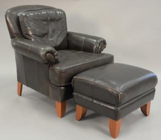 Appraisal: Leather easy chair and ottoman Leather easy chair and ottoman