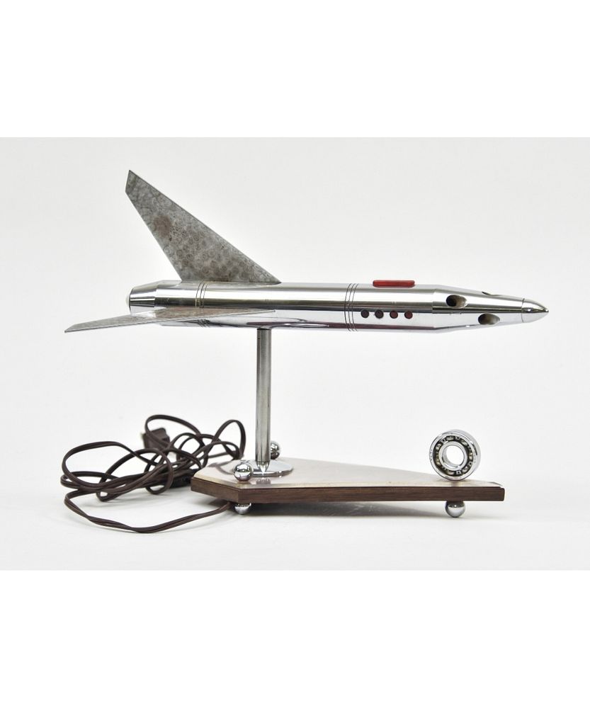 Appraisal: Chrome Jet Airliner Table Lamp Chrome jet airliner table lamp