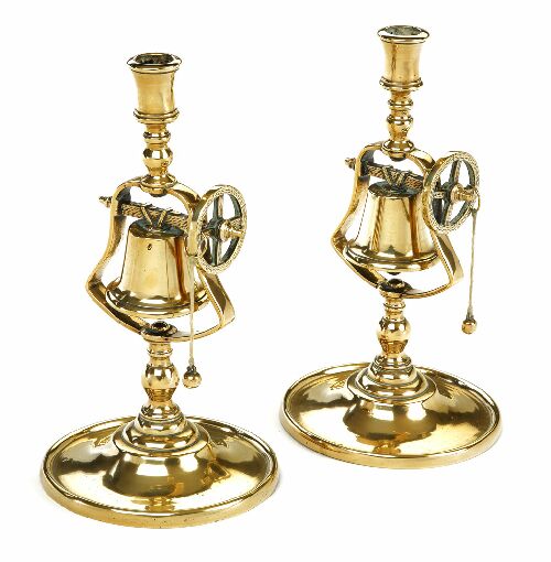 Appraisal: A pair of th century brass tavern candlesticks each with