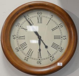 Appraisal: Large Ethan Allen walnut framed round clock dia Provenance Property