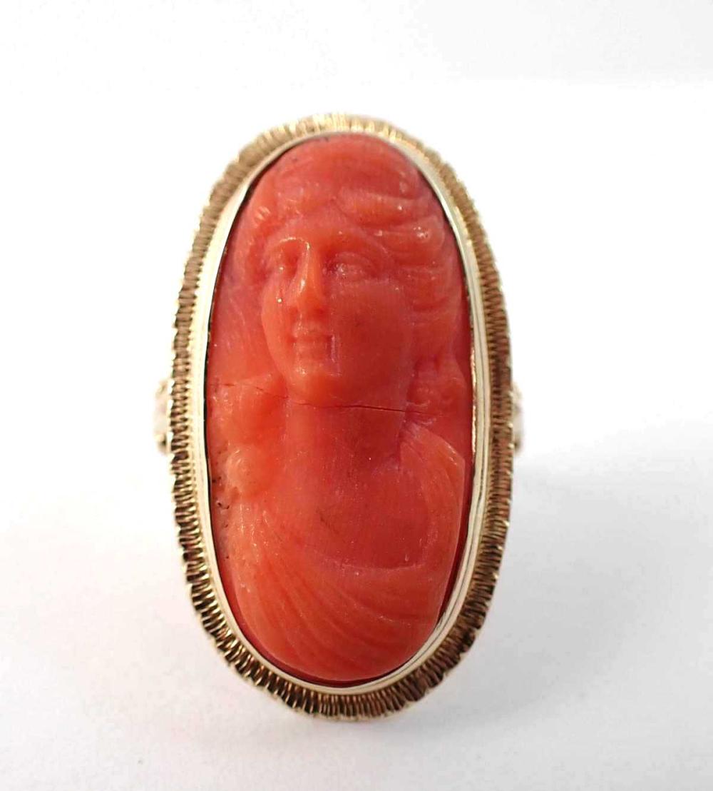 Appraisal: CORAL CAMEO AND FOURTEEN KARAT GOLD RING bezel set with