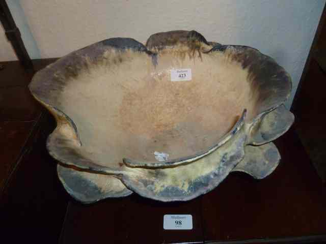 Appraisal: A STUDIO POTTERY LARGE OPEN BOWL of flower form across