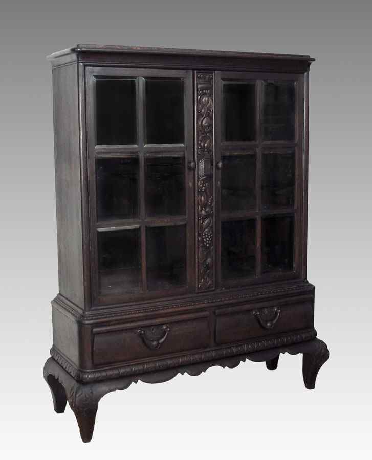 Appraisal: CARVED OAK BOOKCASE CABINET ON STAND Two piece cabinet with