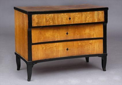 Appraisal: BIEDERMEIER BIRCH AND EBONIZED COMMODE The rectangular top with applied