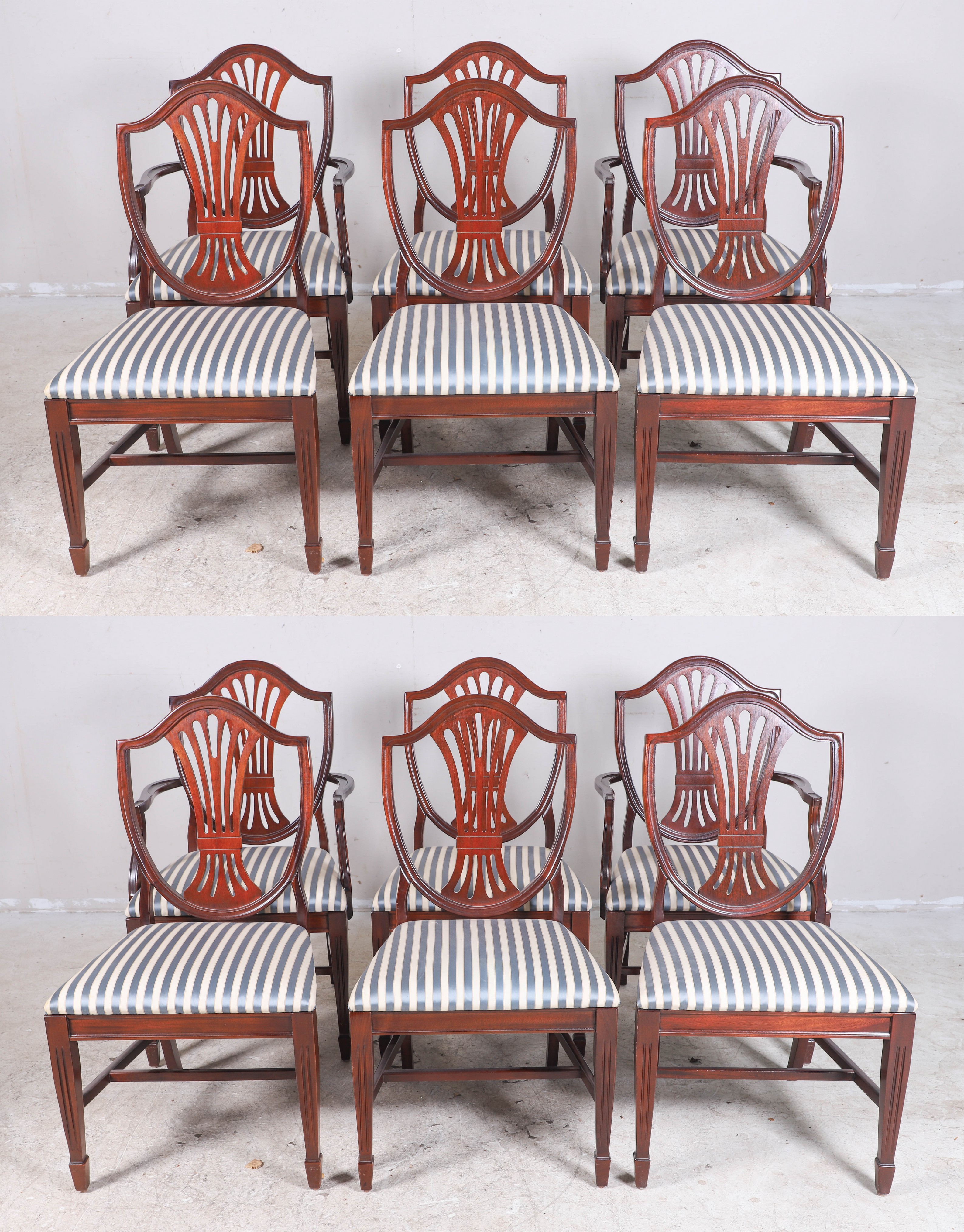 Appraisal: Federal style mahogany shield back dining chairs pierced carved backs