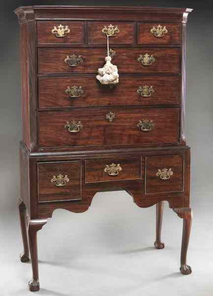 Appraisal: English mahogany highboy the top sectionwith molded cornice three short